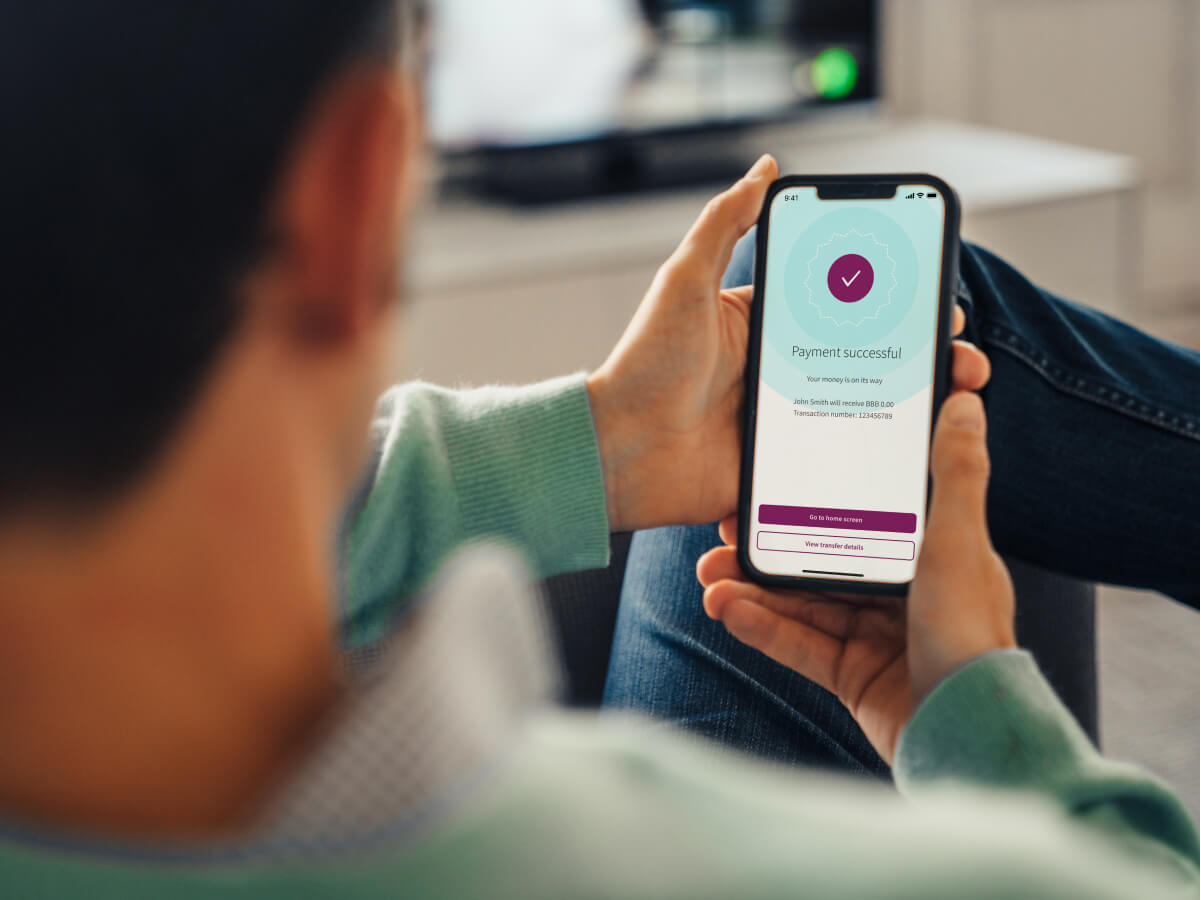 phone showing successful payment on Skrill