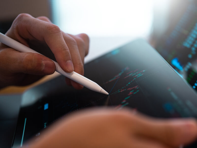 trader studying price charts