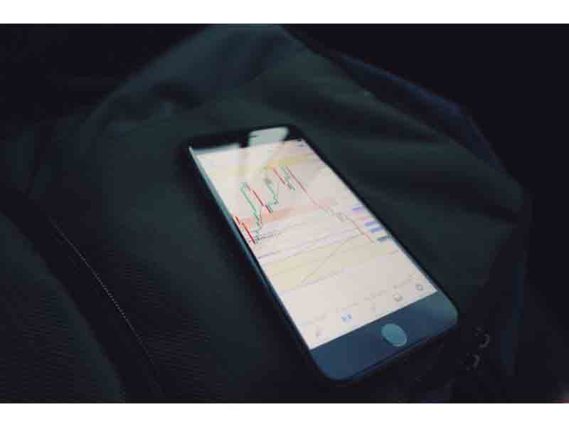 phone with trading screen
