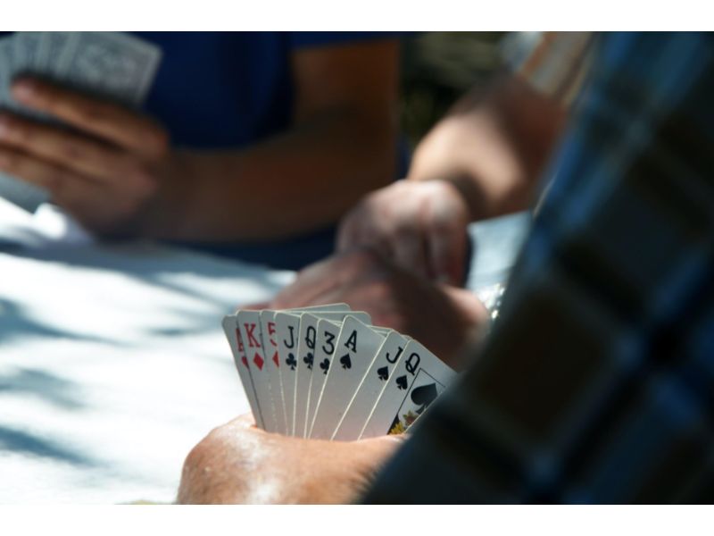 3 people playing poker