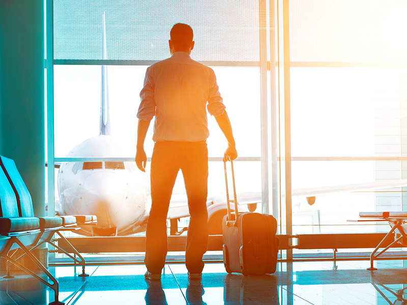 man with a suitcase at the airport
