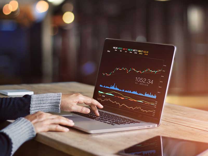 forex trading screen on a laptop