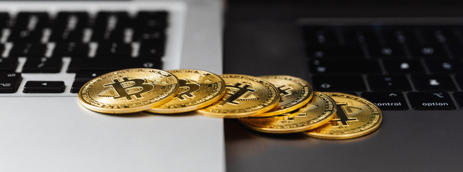 Bitcoins on laptop