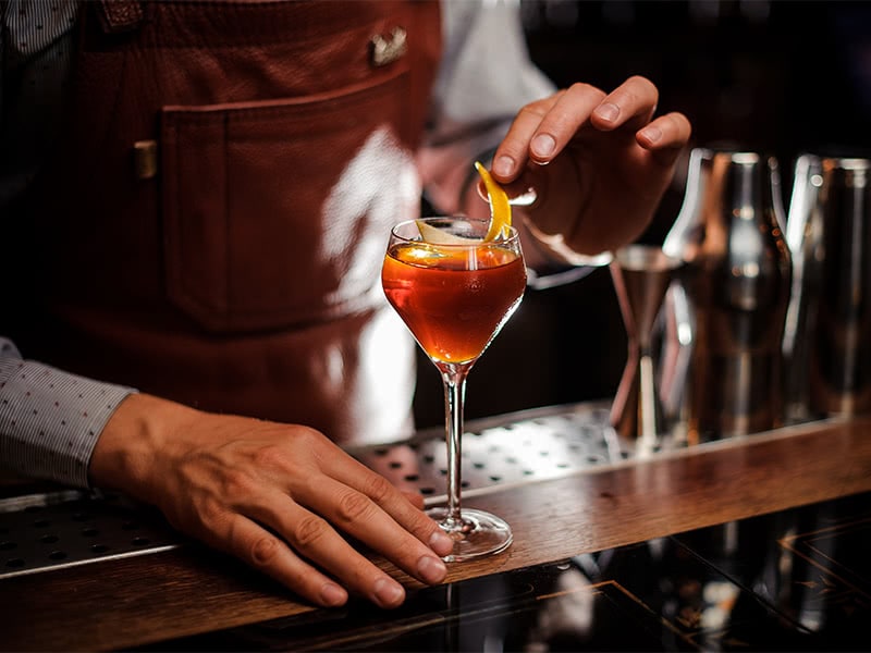 bartender preparing a cocktail