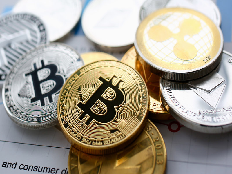 A physical representation of Bitcoin in gold and silver coins