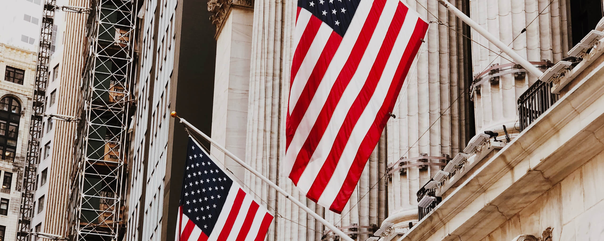American glags hanging from a building