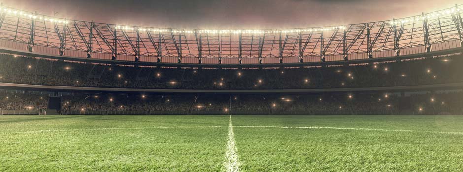full stadium with lights on