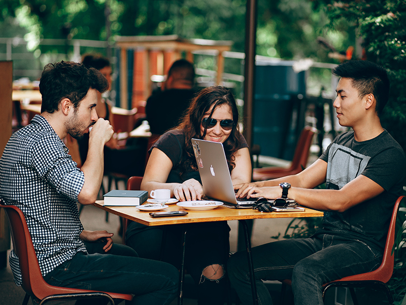 working outside in a cafe