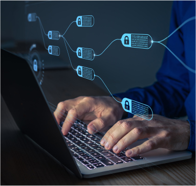 man typing on a laptop