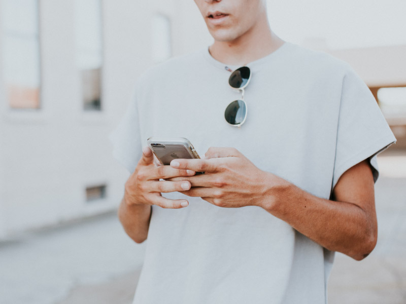 man holding mobile phone
