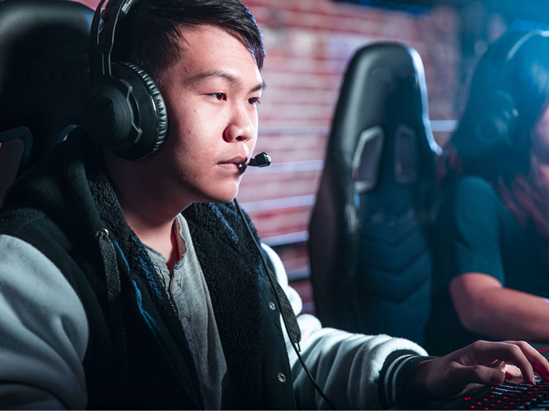 a concentrated gamer playing