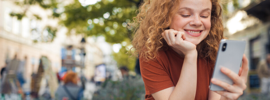 girl looking at her phone