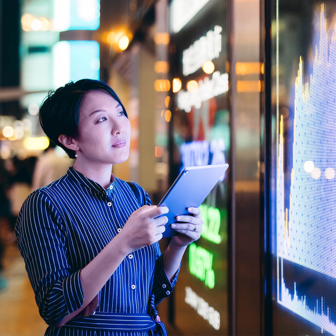 woman looking at forex rates